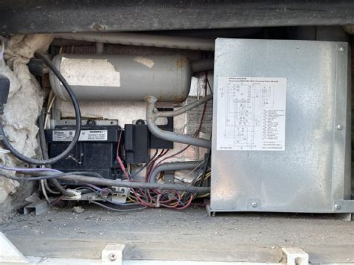 How do I turn on my Norcold refrigerator in my RV?