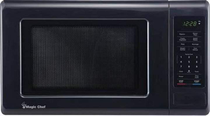 How do you open the Magic Chef microwave?
