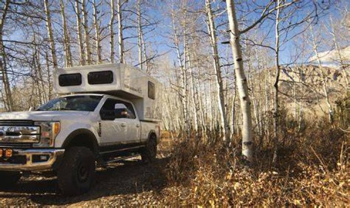 How much does a shadow cruiser slide in camper weigh?
