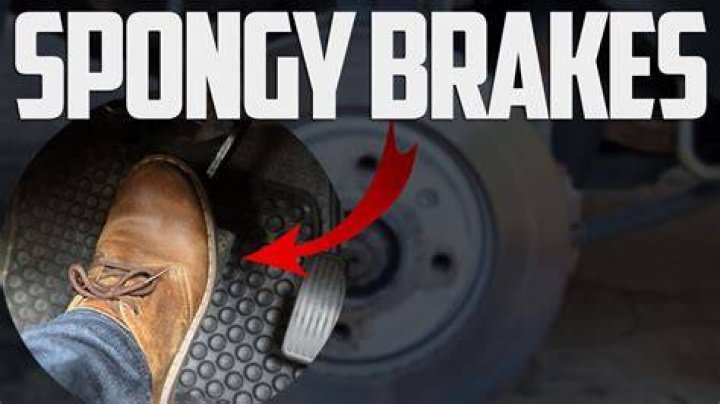 What causes low spongy brakes?