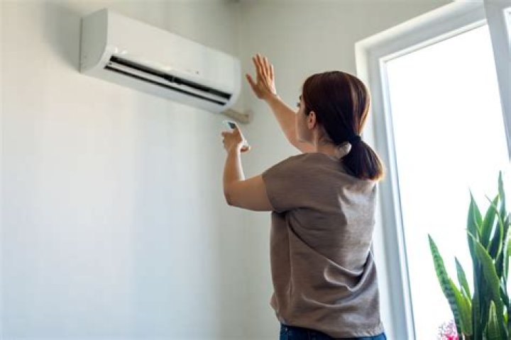 What does it mean when your air conditioner is spitting water?