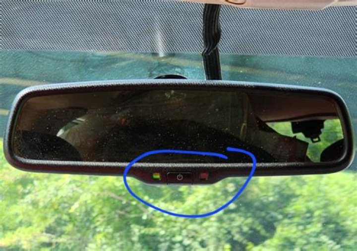Why does my rear view mirror have a power button?
